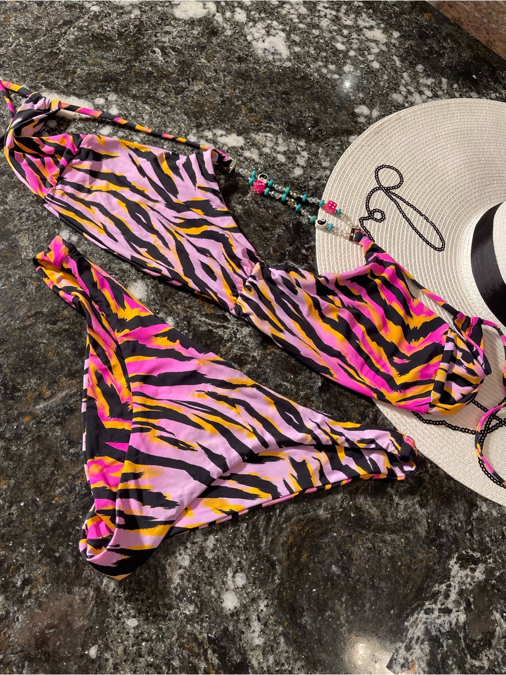 Pink zebra bikini set by beach bunny XL top and L bottoms adorned with charms